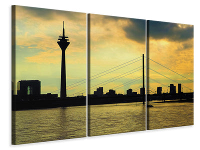3-piece-canvas-print-skyline-in-the-evening-light